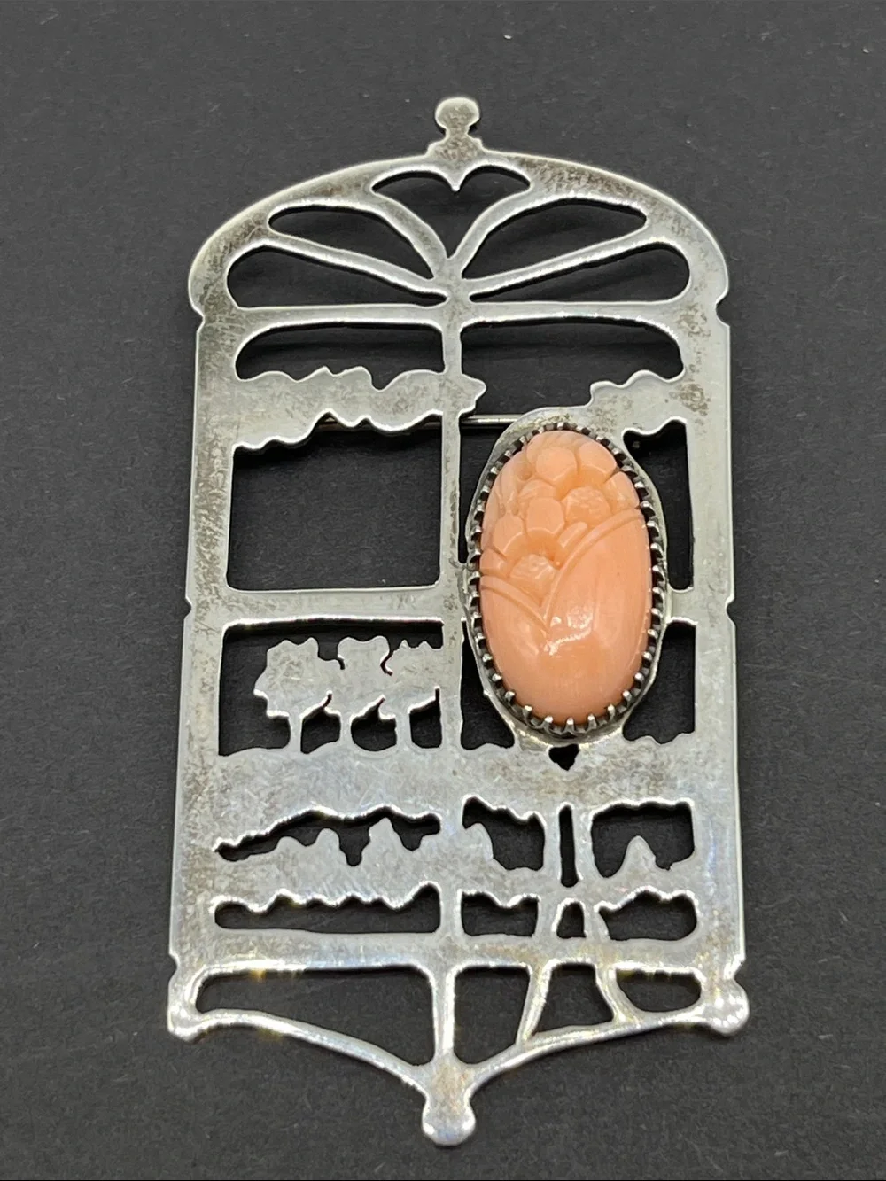 Vintage art nouveau sterling silver brooch with floral carving
